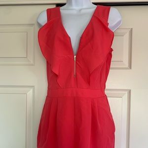 Pink express one piece romper with functioning front zipper. Size 4